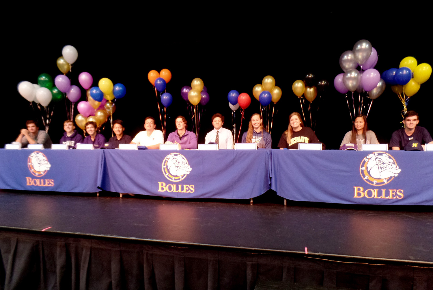 Bolles student athletes sign on to further their athletic careers in college.